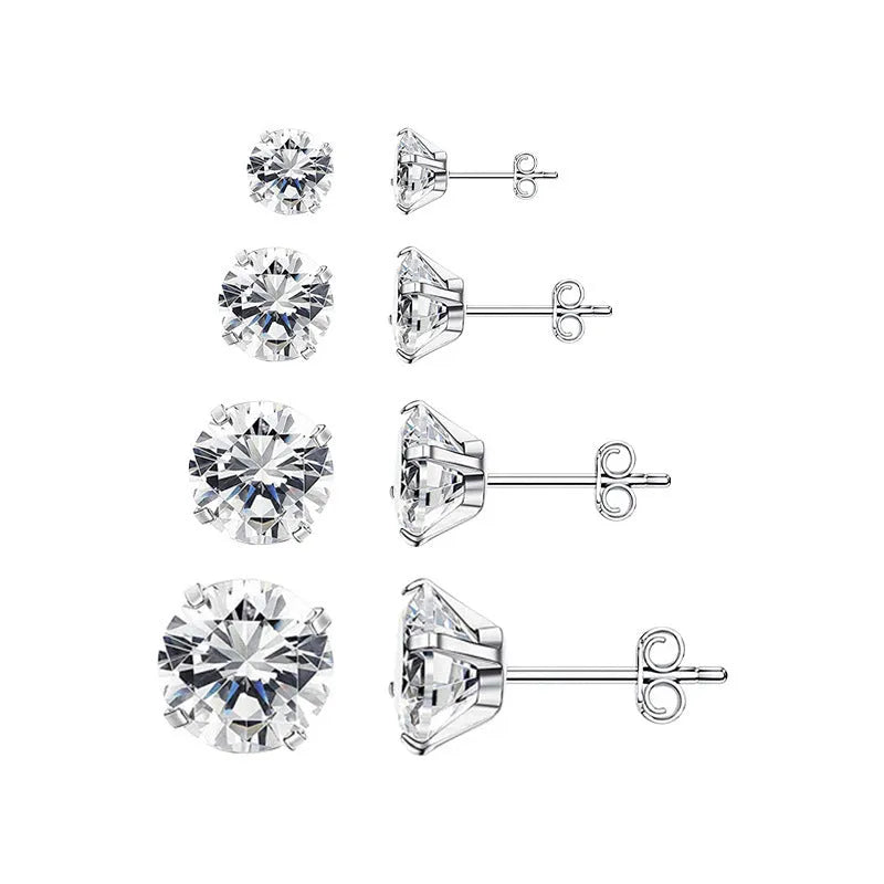Simple geometric stud earrings with a round zircon stone on a stainless steel post, available in gold or steel colour.