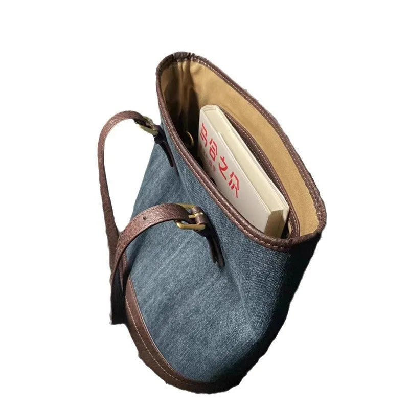 Denim patchwork one-shoulder bucket handbag showing 23x27x16cm dimensions and retro design