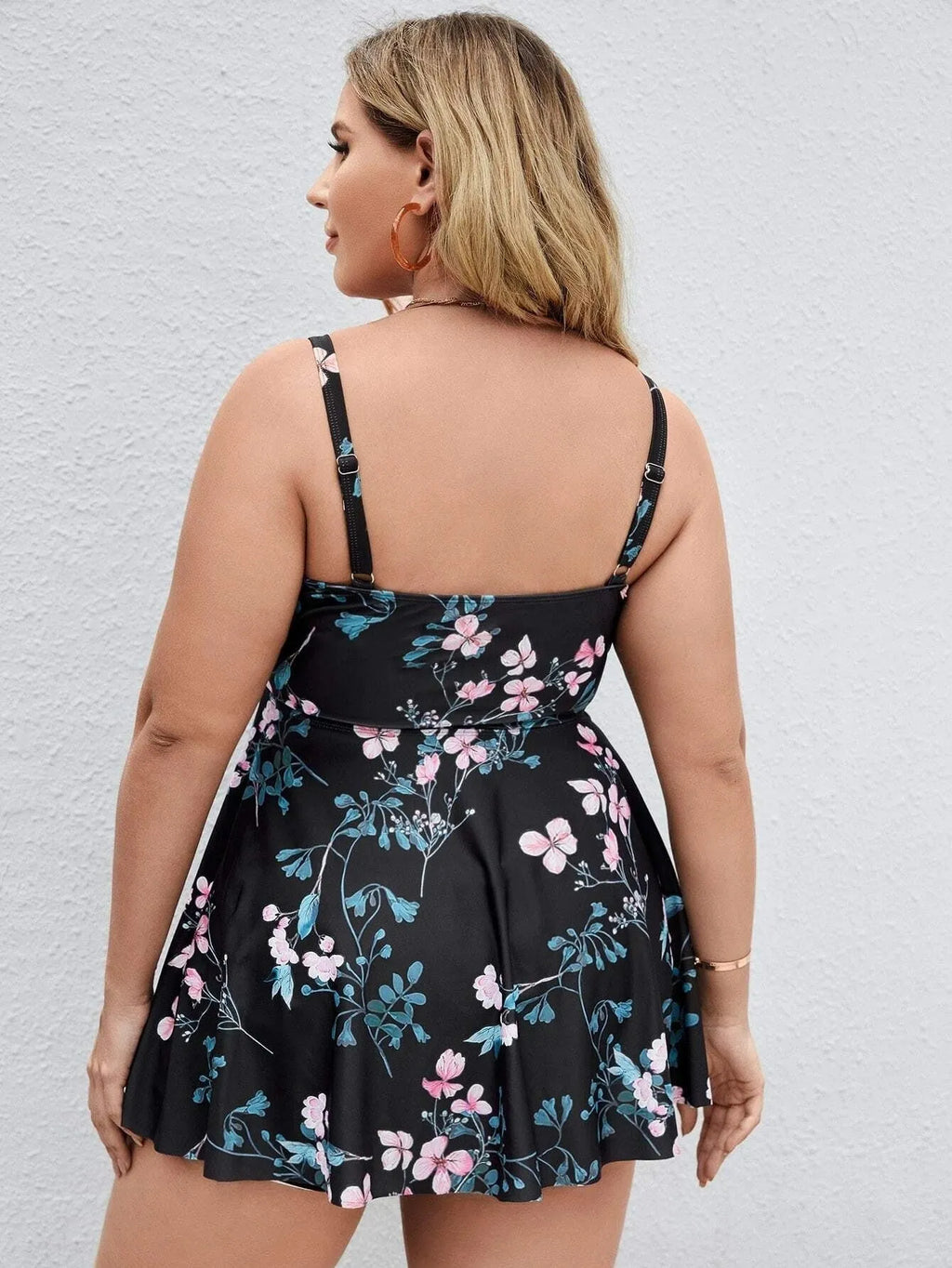 Women's floral print one-piece swimsuit with split colour design on high elasticity polyester fabric.