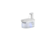 White battery-powered cat water fountain with faucet design, 3.2L capacity, on a kitchen floor