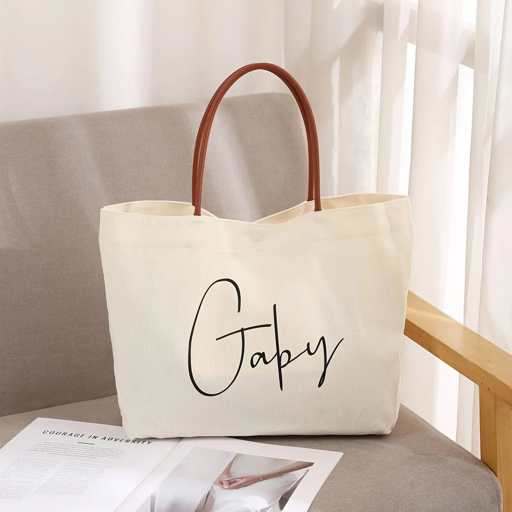 Canvas tote bag with side gussets in beige white colour, shown with handles extended
