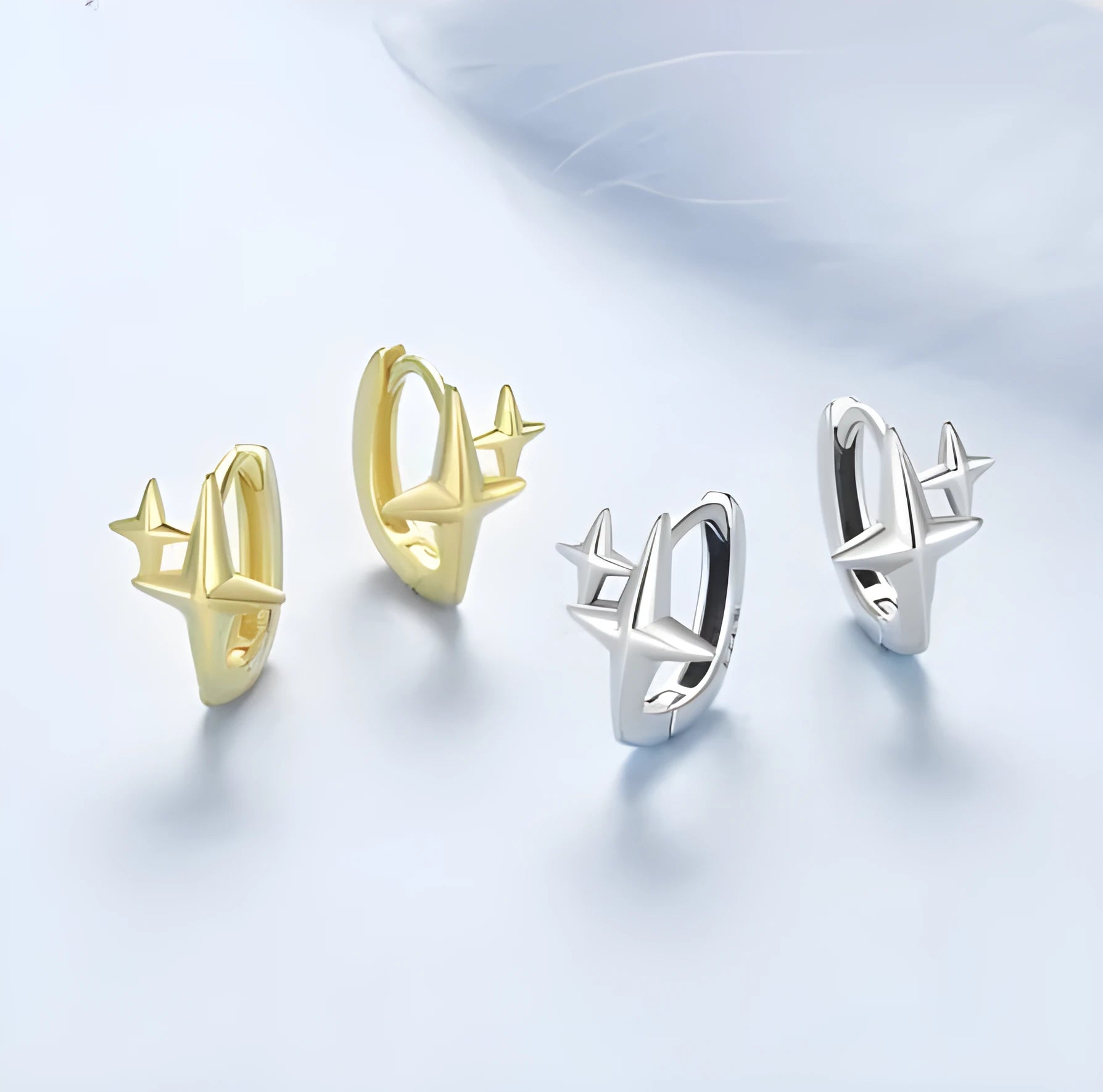 Sterling silver minimalist star ear clips with XINGX design elements and clip-on back