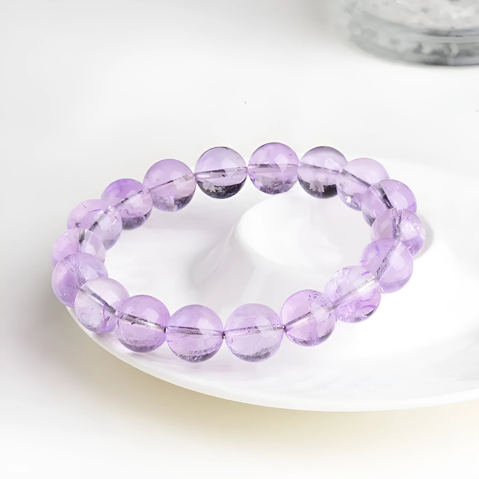 Lavender amethyst crystal bracelet with round beads and water ripple design elements