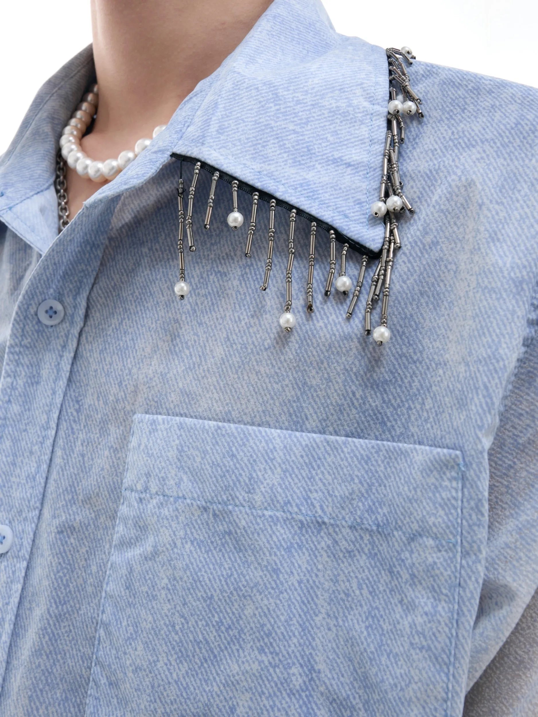 Blue to white gradient loose-fit short sleeve polyester shirt on a hanger.