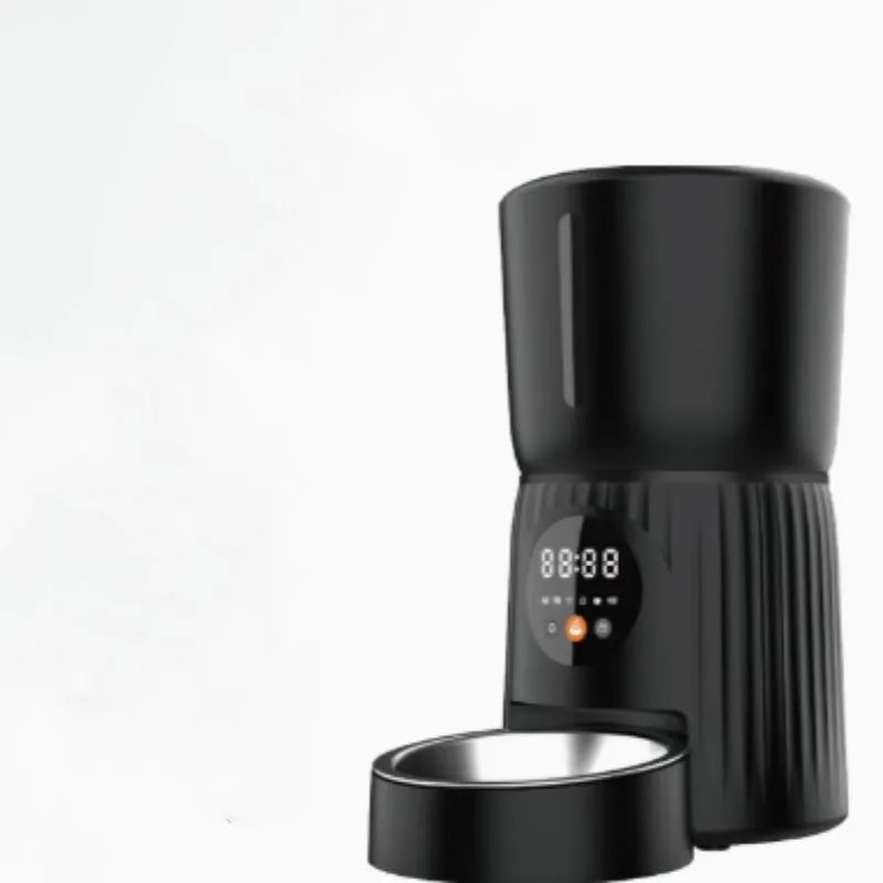 Black and white automatic pet feeder with USB power connection for timed remote feeding