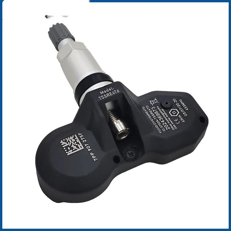 Audi car tyre pressure monitoring system TPMS replacement sensor with black valve cap.
