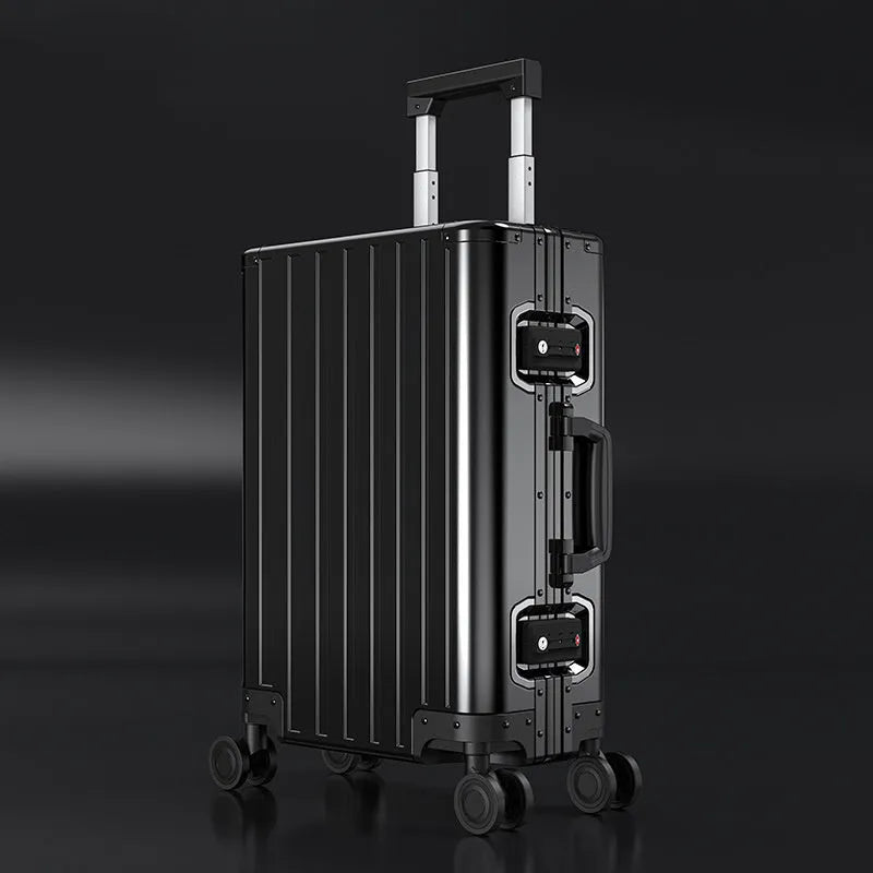 Aluminium magnesium alloy hard-shell travel luggage in a striped design, shown in silver finish.