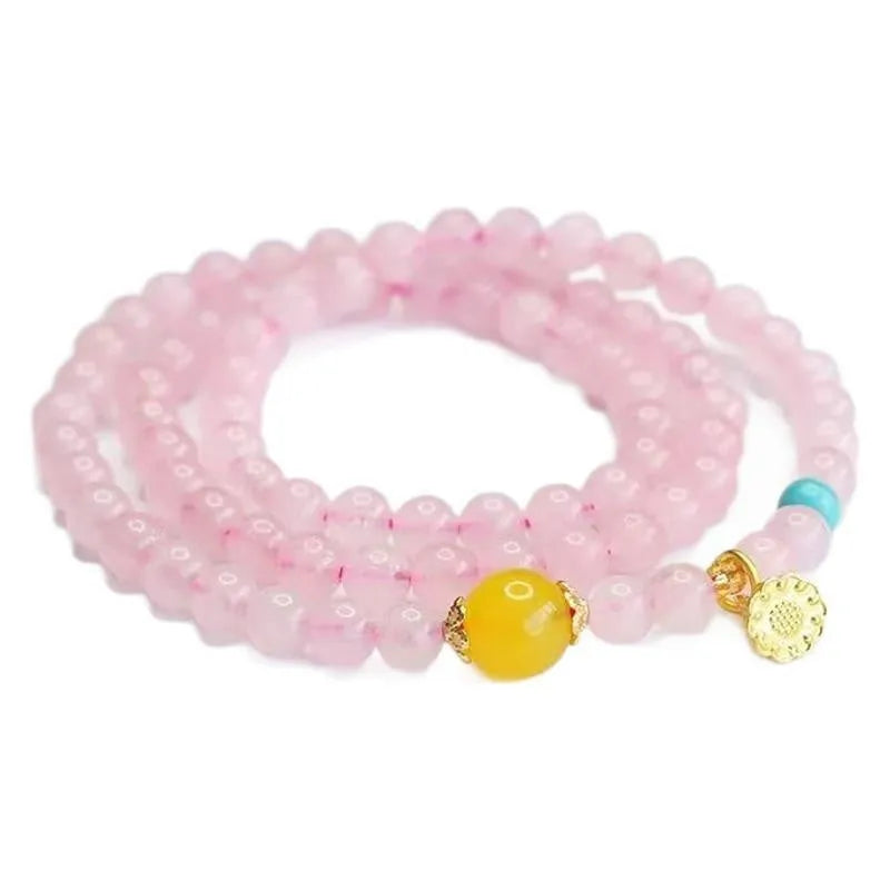 Pink crystal multi-circle bracelet with classic Pi Xui design and artificial crystal construction