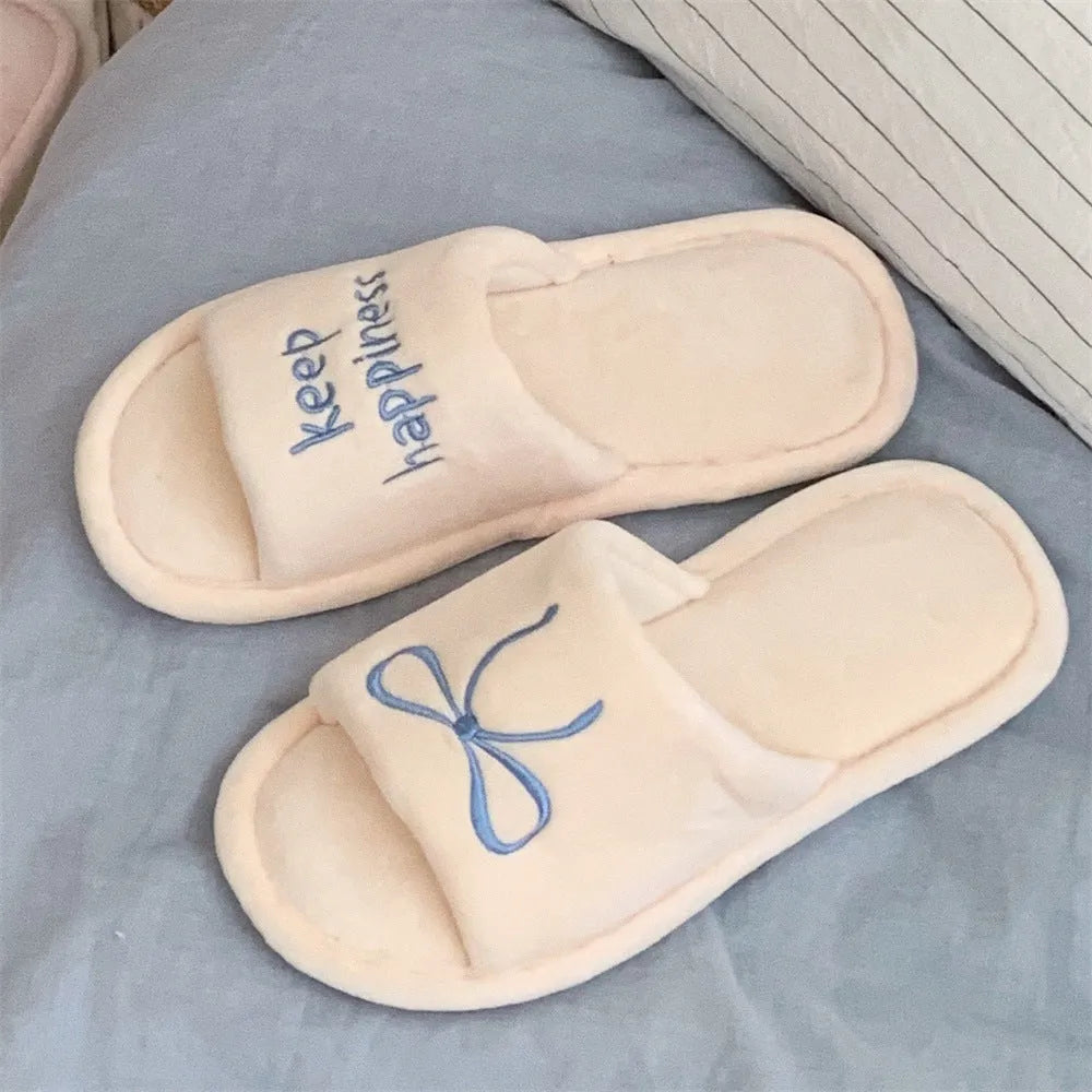 Ladies cotton slippers with letter pattern, bow, suede upper and flat non-slip PVC sole in beige yellow, pink or black