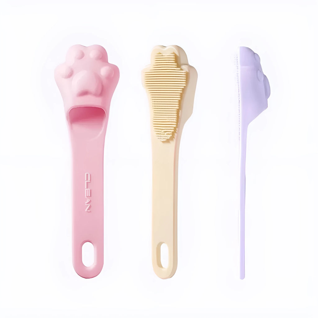 Silicone finger cover toothbrush for pet dental cleaning in pink, purple, and yellow colours.