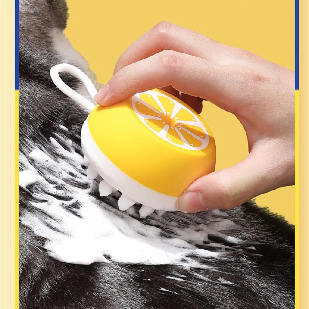 Yellow silicone pet bath brush showing massage head and combed grooming sides for dog and cat washing