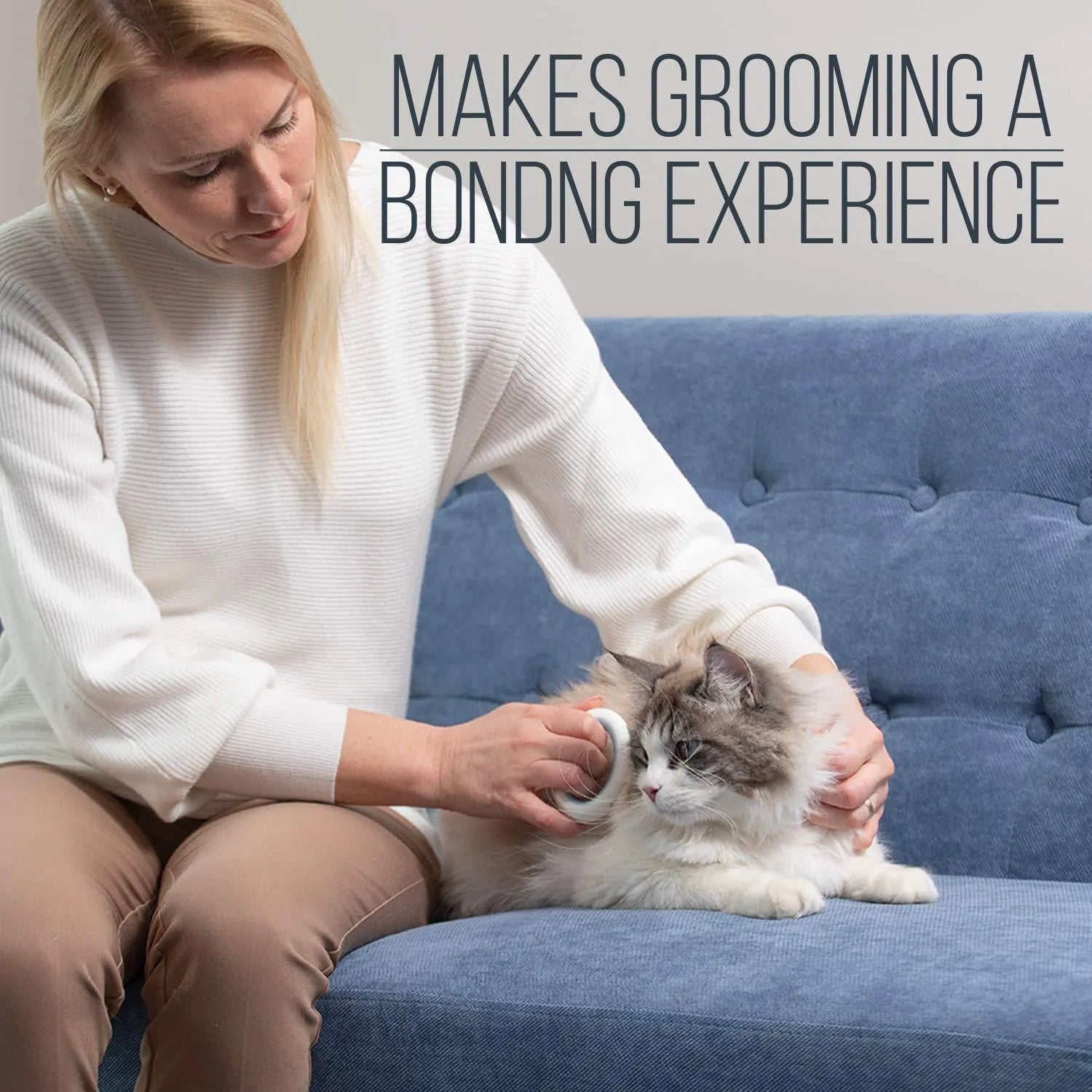 Blue pet grooming comb with soft teeth for deshedding cats and dogs on white background