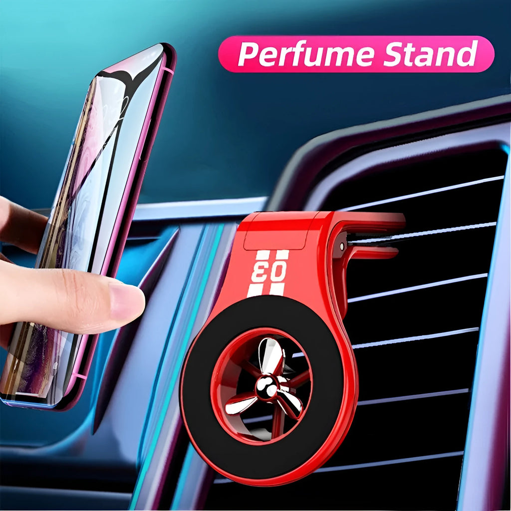 Magnetic car phone holder with fragrance diffuser clipped to car air vent