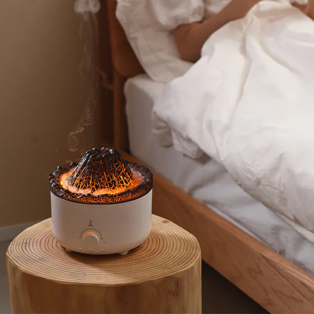 White columnar volcano humidifier with simulated flame lighting effect and remote control