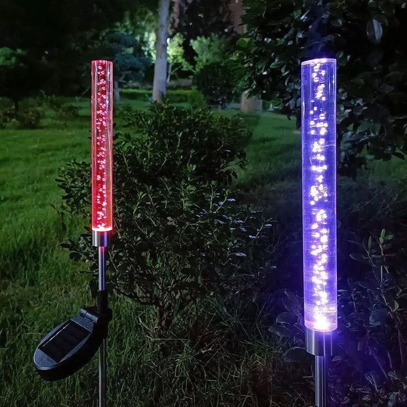 Solar bubble stick lawn lamp in stainless steel and acrylic with warm light and colorful slow flash effect