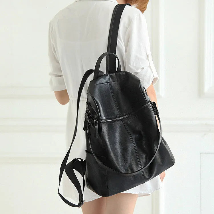 Genuine leather women's retro backpack showing multiple compartments and European-American styling