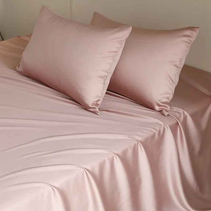 Light grey Tencel Lyocell bed sheet with twill weave, shown folded to display texture and solid colour.