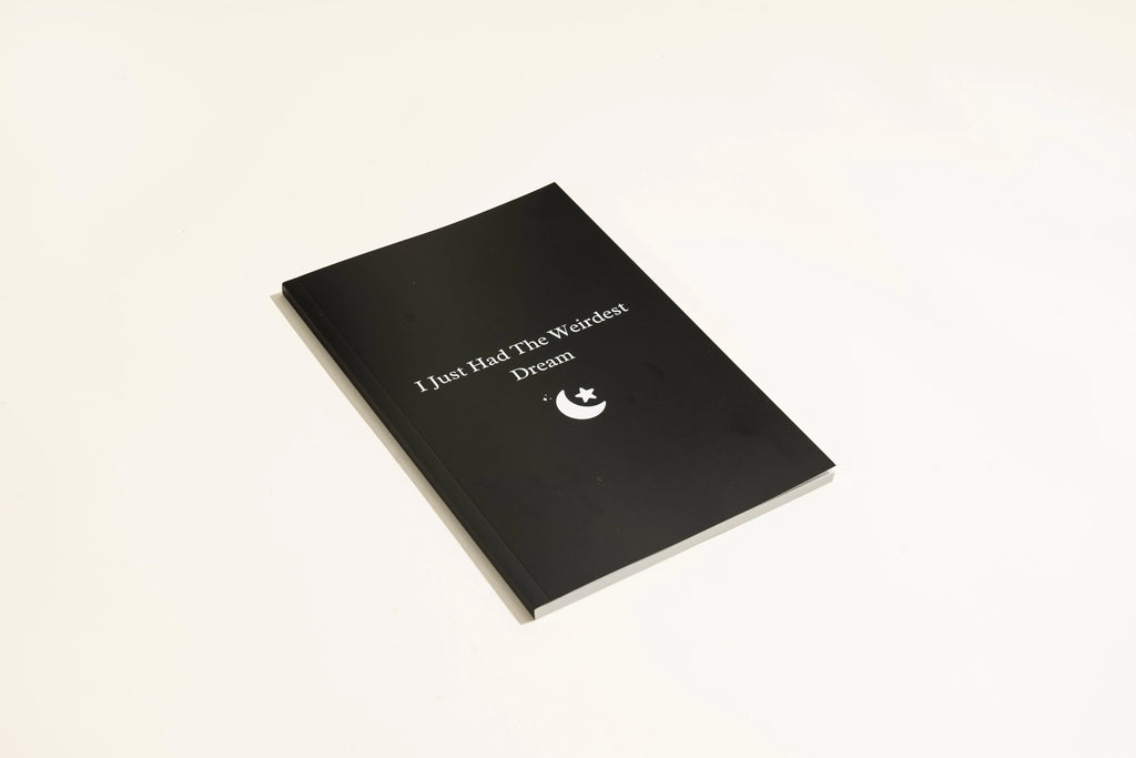 A5 black dream journal notebook with dot grid pages for dream recording