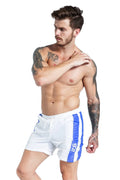 Men's blue lace-up sports shorts with padding, slim-fit polyester design