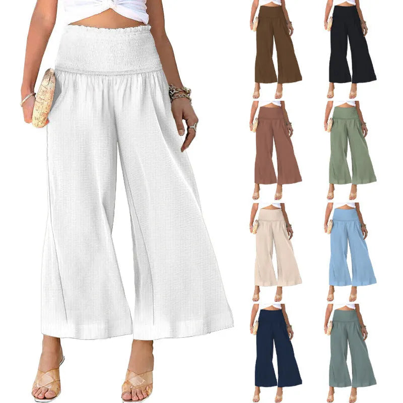Women's high waist pleated cropped trousers in a cotton linen blend, shown in a straight-leg cut.
