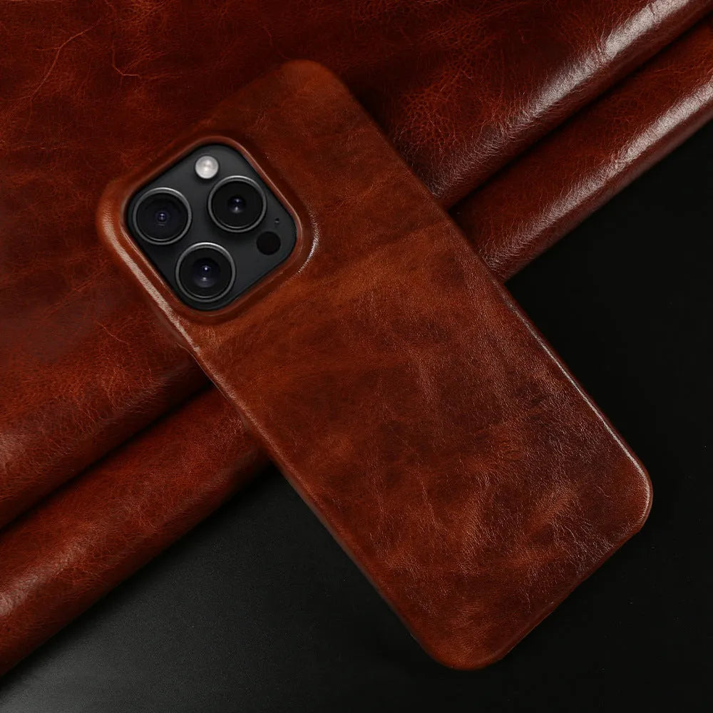 Handmade genuine leather iPhone 16 case in black, brown, dark blue, dark brown, or dark red