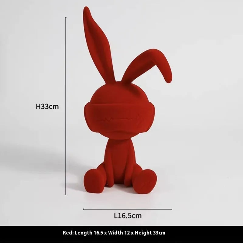 Suede blindfold rabbit resin table ornament in green, blue, or red colour options.
