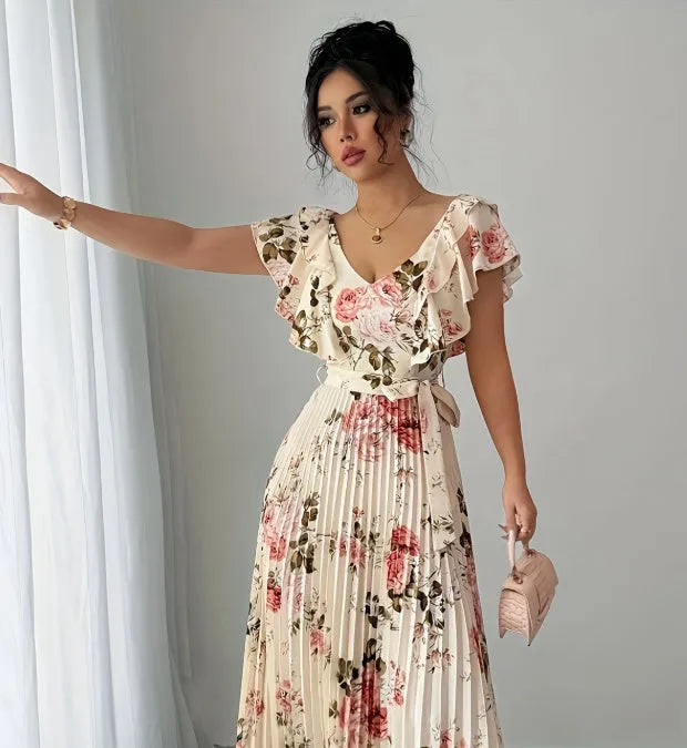 Apricot V-neck floral print dress with ruffled sleeves and an oversized swing skirt.
