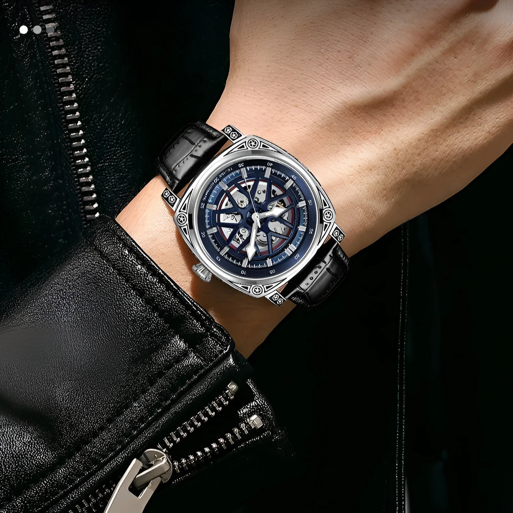 Men's automatic watch with stainless steel case and blue leather strap showing time on dial