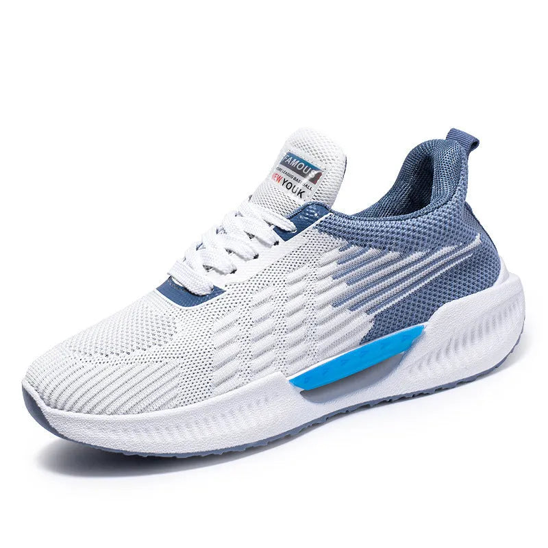 Men's blue casual sports mesh shoes with round toe and cloth upper on a plain background.