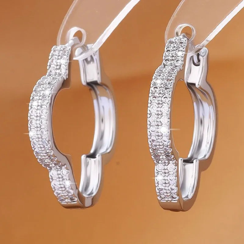 Gold copper heart-shaped earrings with micro-inlaid zirconia stones geometric design