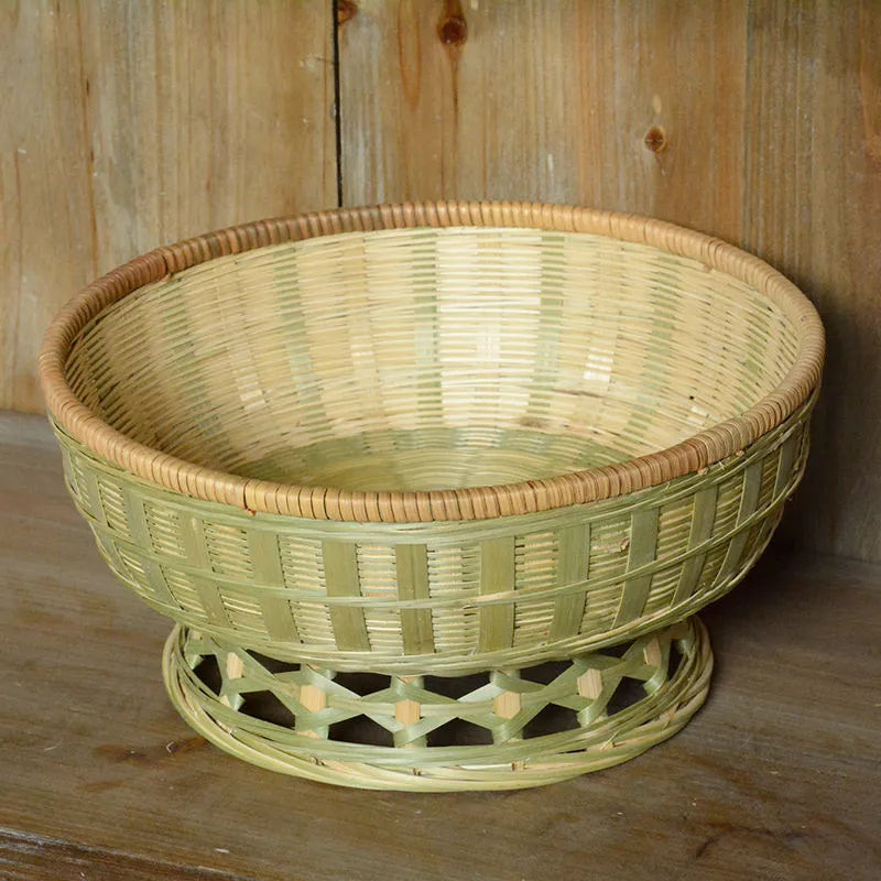 Handmade natural bamboo storage basket in traditional woven construction