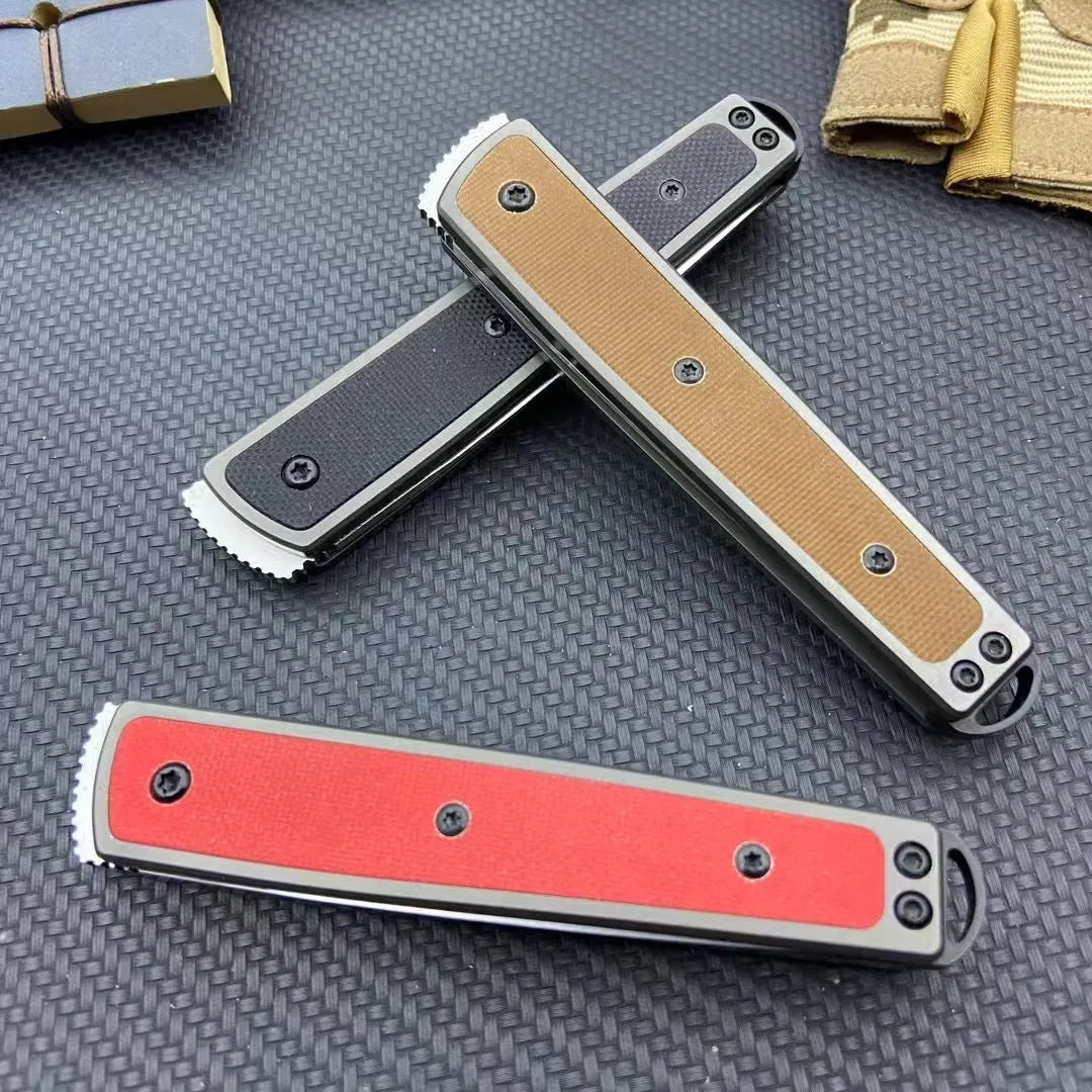 Closed and opened views of a black folding fruit knife showing the stainless steel blade and handle.