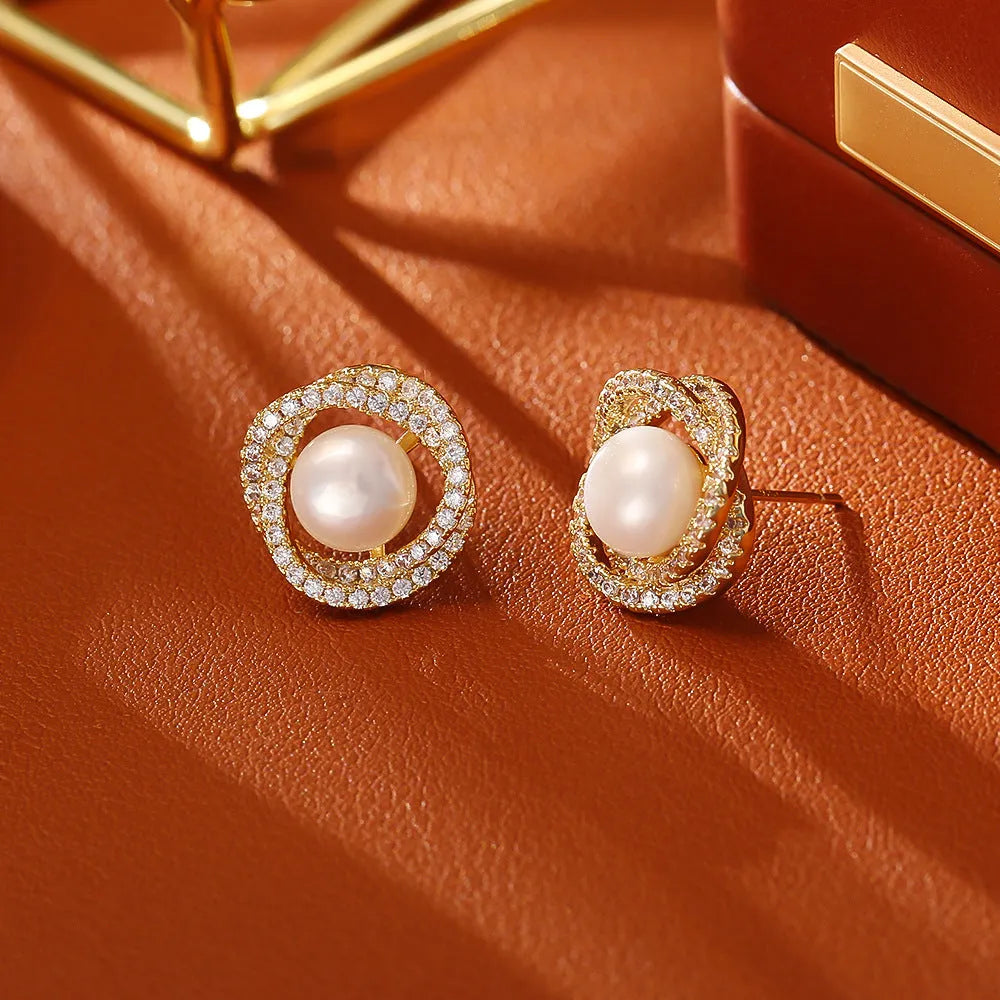 Natural pearl stud earrings with real gold plating over environmentally friendly copper, geometric round shape for women