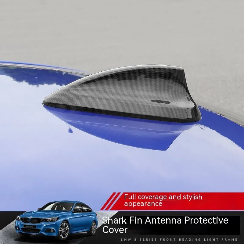 BMW shark fin antenna cover in carbon fibre pattern and piano black finishes