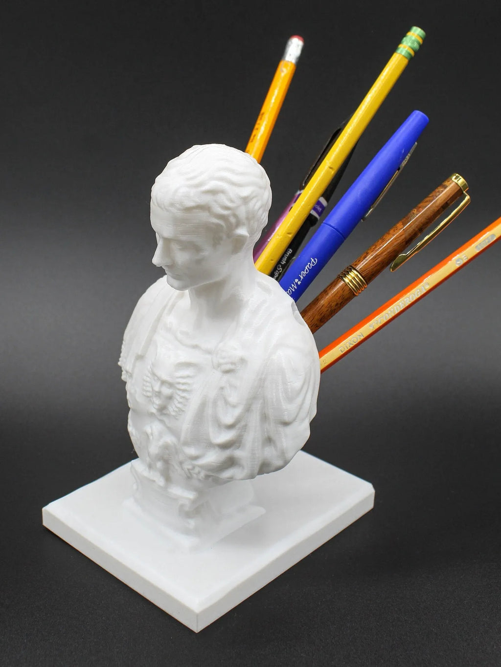 White American character modelling pen holder made from synthetic resin for desk organisation