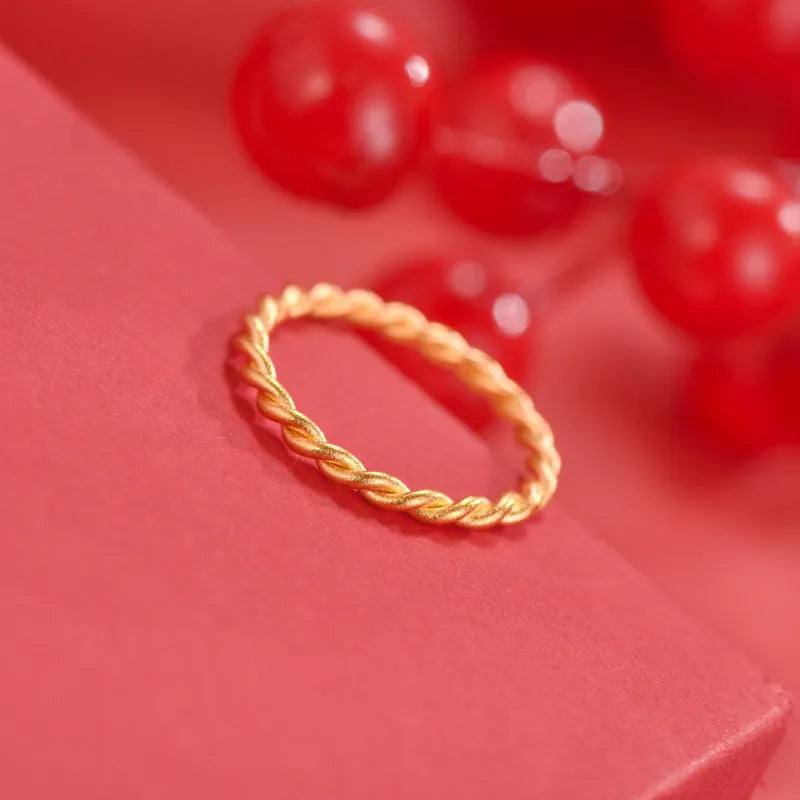 Brass gold plated women's ring in simple bracelet and twist styles, shown in UK sizes 6 to 9.