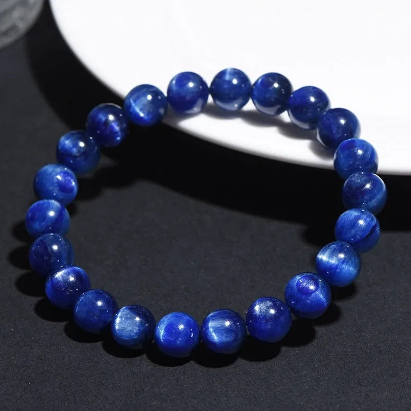 Blue crystal bracelet with geometric Ruyi design showing polished beads in various diameter options