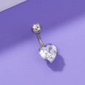 Stainless steel heart-shaped zircon navel pin, 0.8 cm wide and 1.8 cm tall, on white background
