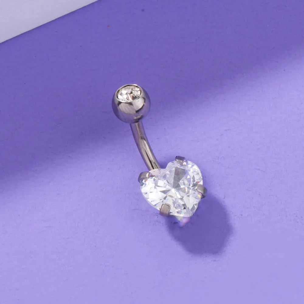 Stainless steel heart-shaped zircon navel pin, 0.8 cm wide and 1.8 cm tall, on white background
