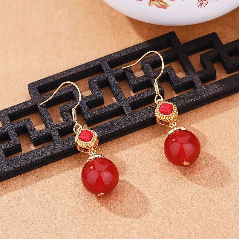 Geometric agate earrings with Southern Red Agate beads and silver inlaid jasper detail on copper alloy