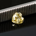 Heart-shaped moissanite loose stone in lemon yellow colour showing six size options