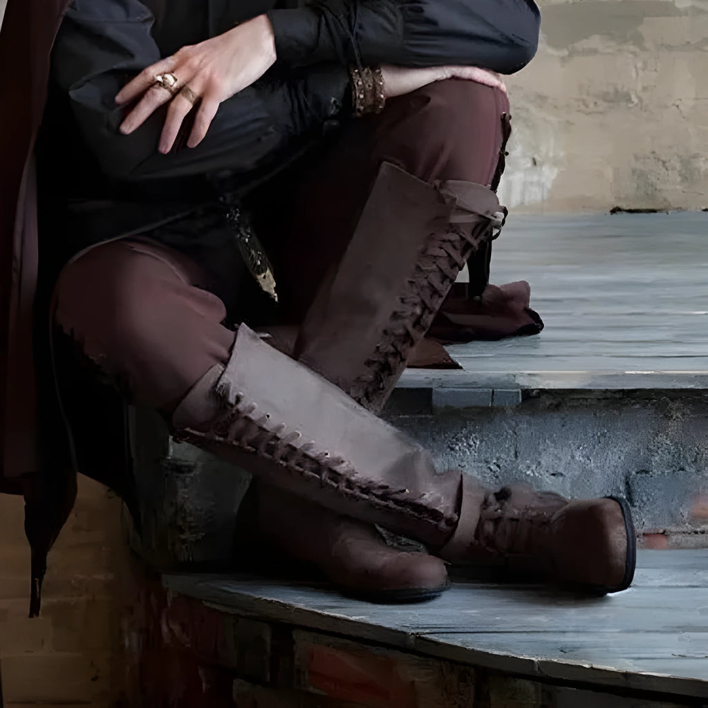 Women's long boots with lace-up front, low heel, artificial PU upper, rubber sole, in black colour