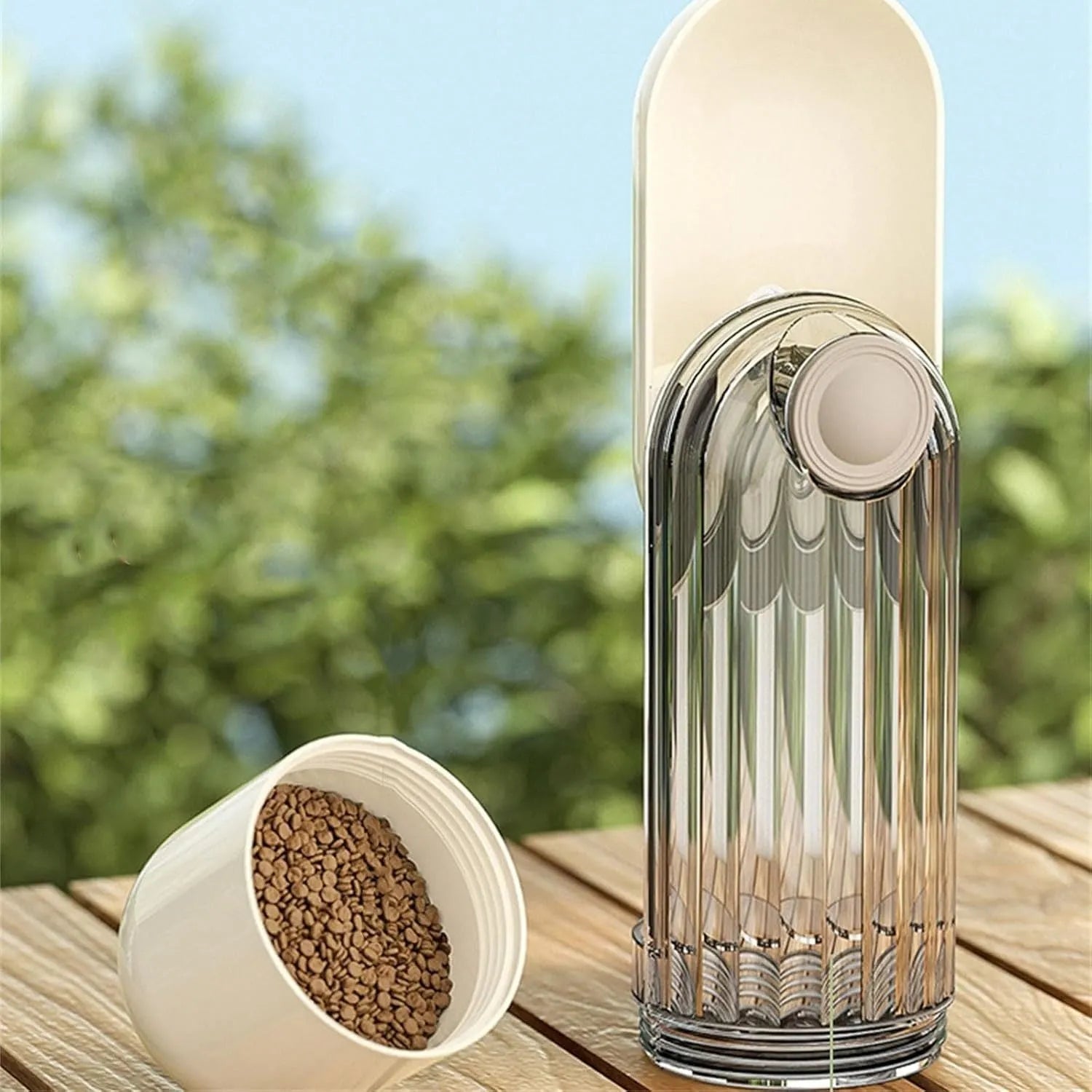 Foldable dog water bottle food dispenser with large drinking opening and integrated snack container