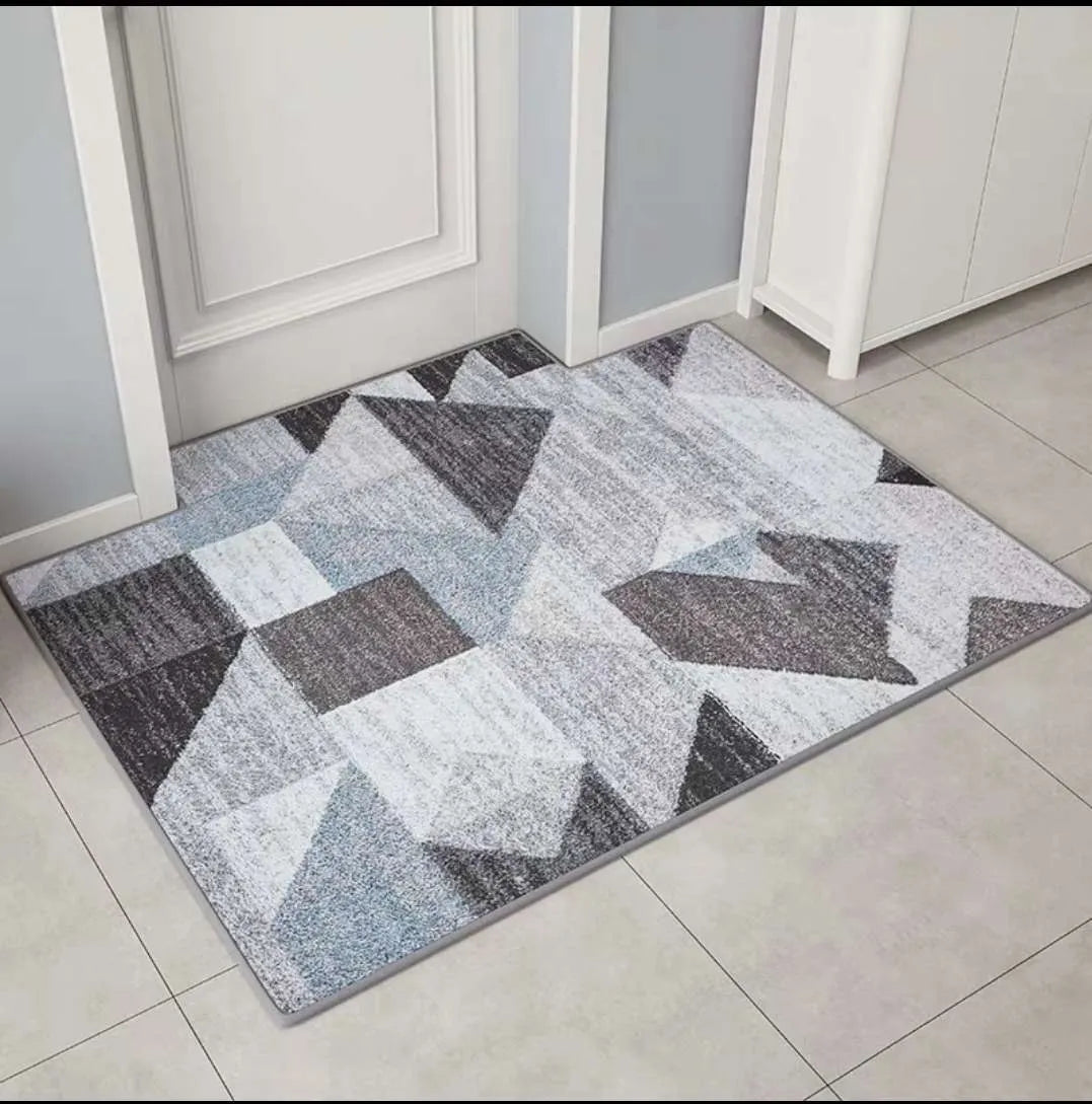 Modern minimalist geometric floor mat in polyester cotton, non-slip, available in wave, hairy geometric, ripple patterns.