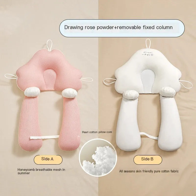 Blue and white U-shaped baby head shaping pillow made of pure cotton on a neutral background.