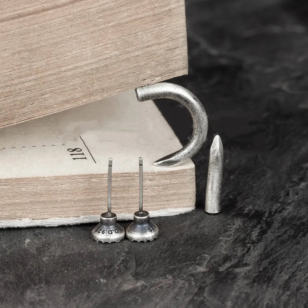 S925 sterling silver nail stud earring on ear hook, straight and curved style shown.
