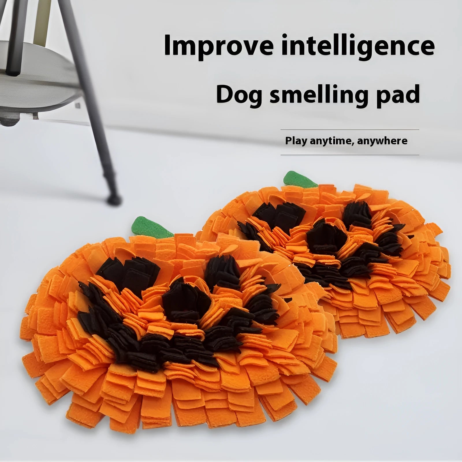 Orange pumpkin-shaped pet slow feeder mat with woollen pad on polar fleece.