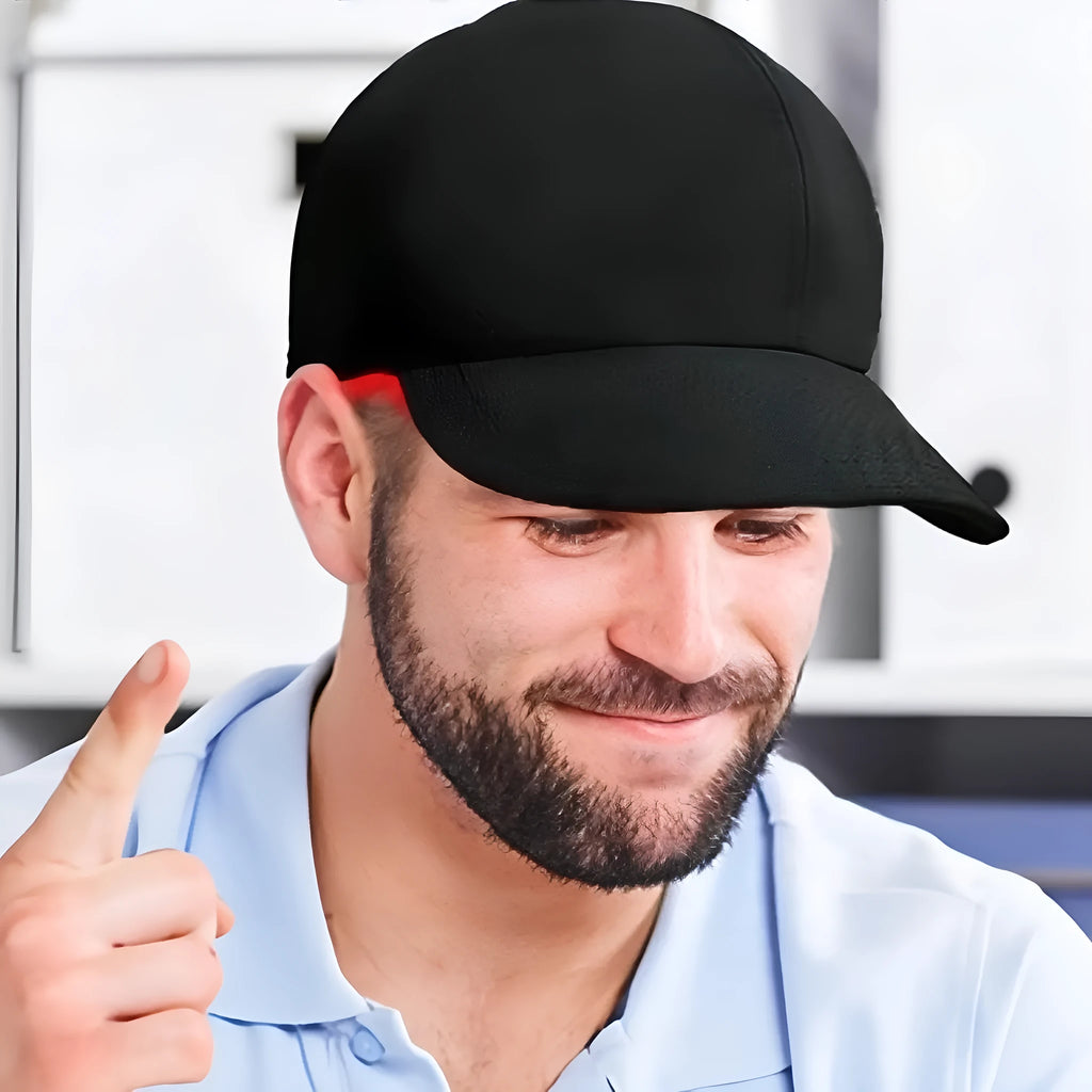 Black duckbill peaked cap with 180 LED light panels for infrared hair growth therapy
