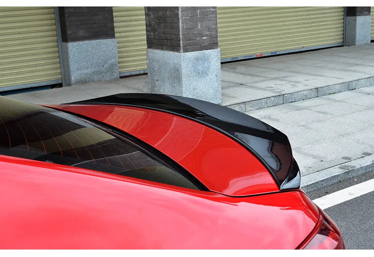 Mazda 3 Axela Exela bright black tail trim spoiler with large fixed wind surround blade design