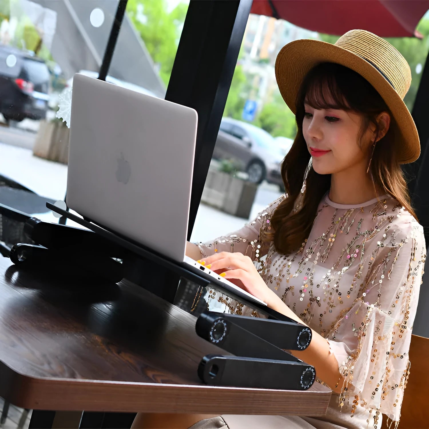 Black folding metal computer desk with cooling hole mouse board in extended position